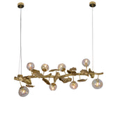 This Organic Glass Bubble Brass Branch Chandelier is artfully designed, it combines with the organic tree branch design, decorated with the metal leaves, creates a fruitfully ideas. it is a new interpretation for the new modern style.