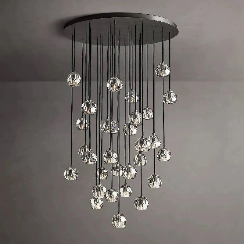 The hexagonal and pentagonal facets on the surface of the K9 glass spheres allow the warm light to reflect beautifully, creating a stunning and inviting ambiance. The overall design of the chandelier highlights its elegance and sophistication, making it a perfect addition to any room that needs a touch of glamour.