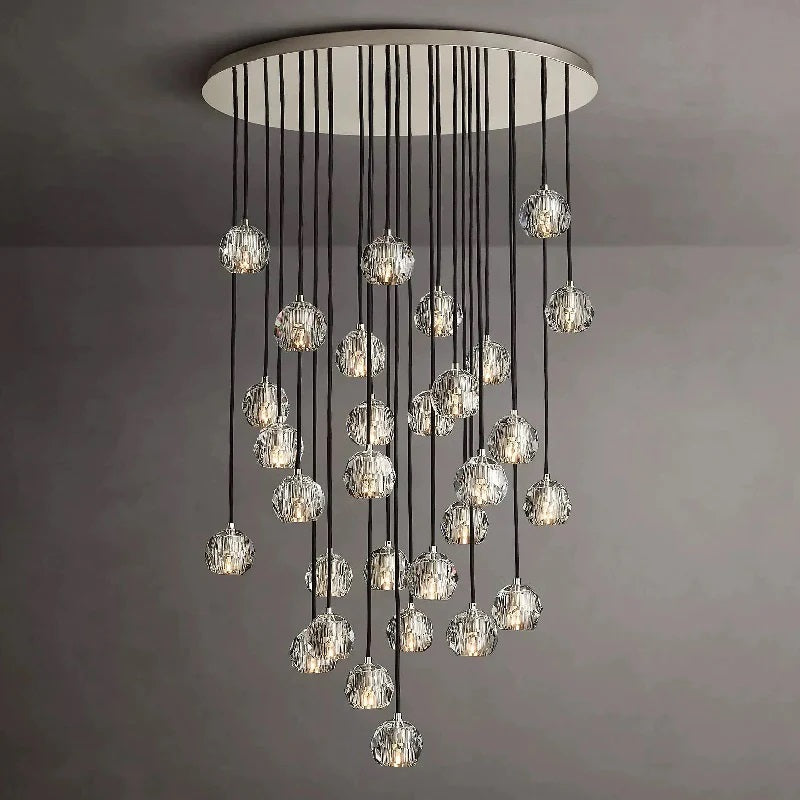 The hexagonal and pentagonal facets on the surface of the K9 glass spheres allow the warm light to reflect beautifully, creating a stunning and inviting ambiance. The overall design of the chandelier highlights its elegance and sophistication, making it a perfect addition to any room that needs a touch of glamour.