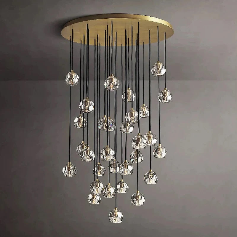 The hexagonal and pentagonal facets on the surface of the K9 glass spheres allow the warm light to reflect beautifully, creating a stunning and inviting ambiance. The overall design of the chandelier highlights its elegance and sophistication, making it a perfect addition to any room that needs a touch of glamour.